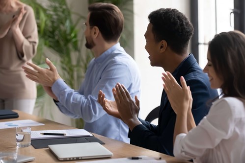 colleagues clapping